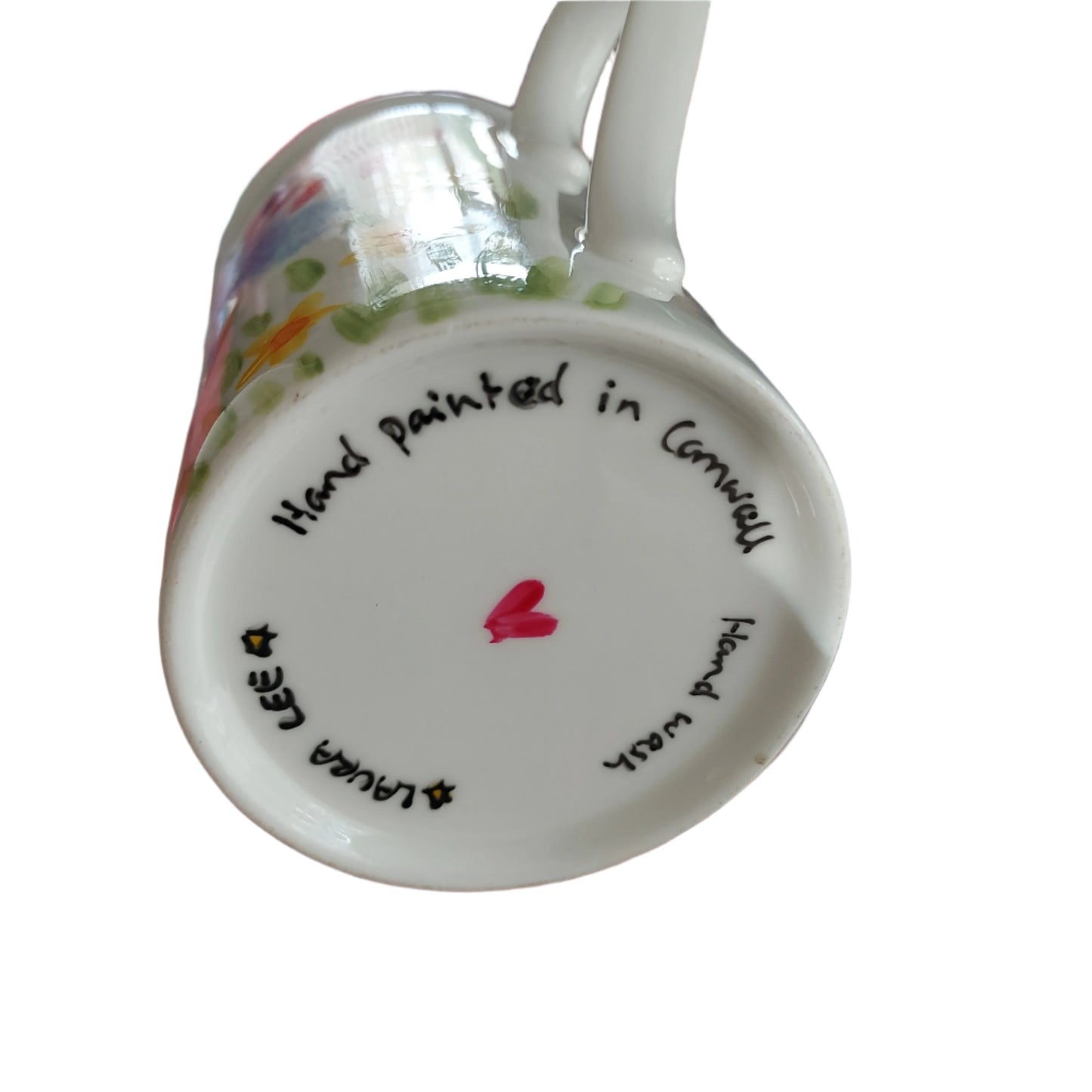 Secret heart on base of Laura Lees meadow flowers mug