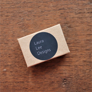 kraft gift box with black Laura Lee Designs sticker