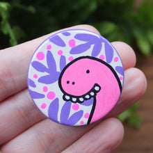 Load image into Gallery viewer, pink goofy dinosaur magnet by Laura Lee Cornwall