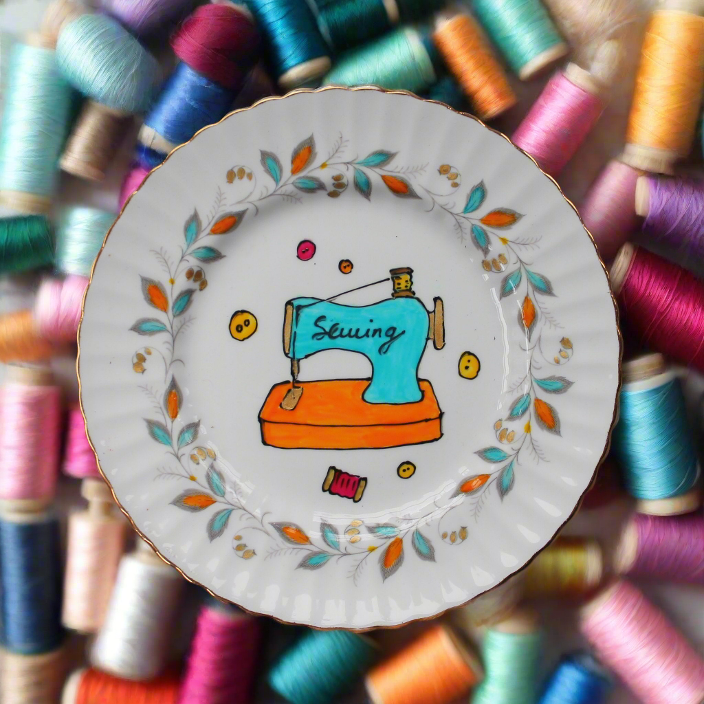 Sewing machine wall plate