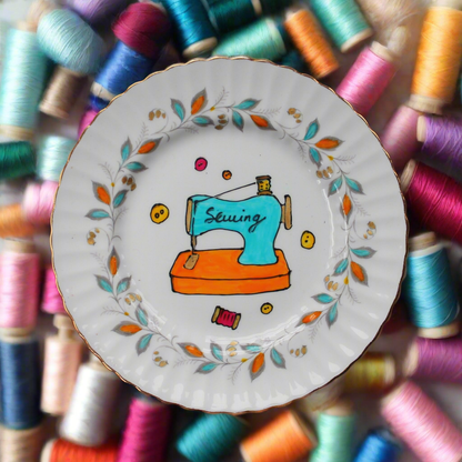 Sewing machine wall plate