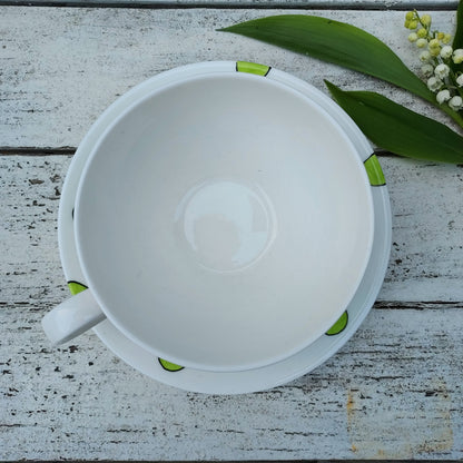 Large teacup and saucer lily of the valley