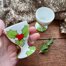 Load image into Gallery viewer, Pair of holly and berry egg cups hand painted by Laura Lee Cornwall