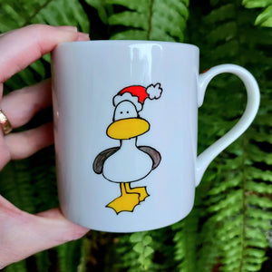 Personalised seagull Christmas mug by Laura Lee Cornwall
