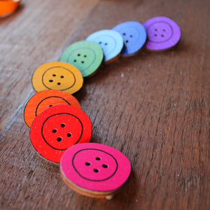 wooden button brooch in a rainbow of colours by Laura Lee Designs in Cornwall
