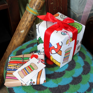 Sewing gift wrap by Laura Lee designs in Cornwall