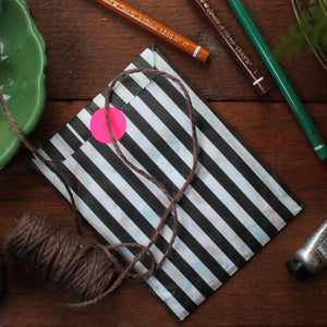 Note book gift wrap black and white stripe bag with colourful sticker