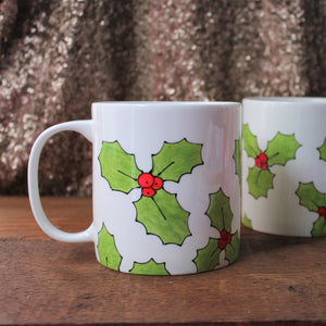 Holly pint mug hand painted jumbo sized mug in green holly with red berries by Laura Lee designs Cornwall