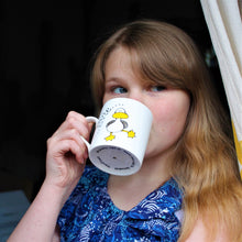 Load image into Gallery viewer, child just turned 12 drinking cocoa from a fun hand painted dancing duck mug by Laura Lee Designs 