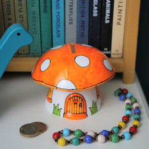 Orange mushroom money box hand painted fine china piggy bank by Laura Lee Designs Cornwall