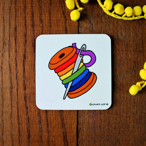 Rainbow bobbin coaster spool of colourful thread and sewing needle by Laura Lee designs Cornwall colourful homewares and gifts