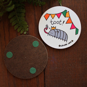 Cyril the woodlouse coaster by Laura Lee Designs Cornwall Entomology gift cute woodlouse blowing a party tooter pill bug in his party hat under colourful bunting