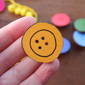 Yellow button brooch by Laura Lee Designs in Cornwall
