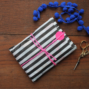 Black and white striped paper gift by gift wrapping by Laura Lee designs Cornwall