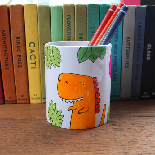 Dinosaur pen pot hand painted by Laura Lee Designs 