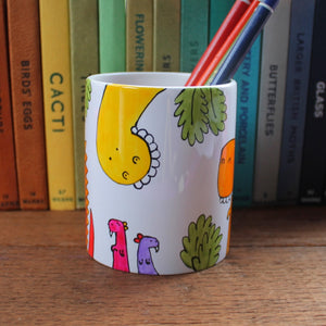 Funny dinosaur pen pot by Laura Lee Designs hand painted in Cornwall