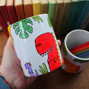 Dinosaurs and tropical plant pen pot by Laura Lee Designs in Cornwall