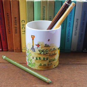 hand painted gardeners plant marker pot