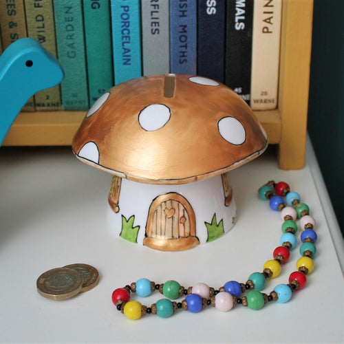 Limited edition golden toadstool money box by Laura Lee Designs Cornwall