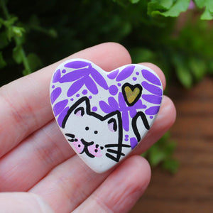 Purple ferns and a gold heart white cat magnet 