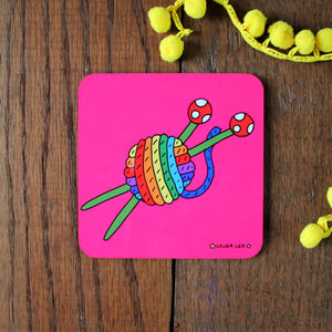 bright pink knitters coaster with rainbow yarn and needles by Laura Lee Designs Cornwall