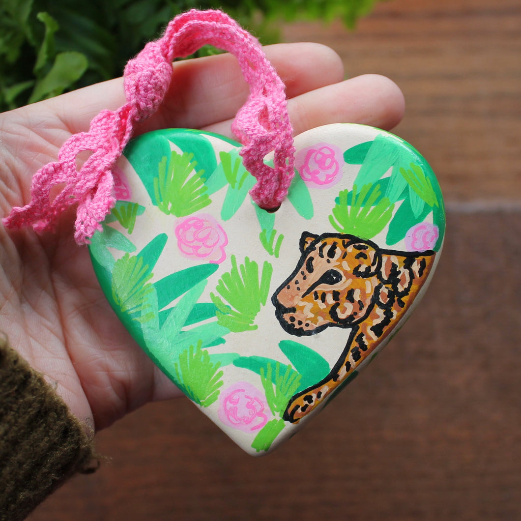 Leopard and roses hand painted ceramic heart by Laura Lee Cornwall