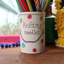 Load image into Gallery viewer, Scattered colourful buttons on a llama knitting needle storage jar