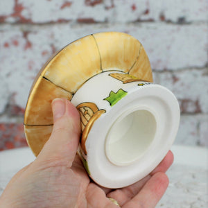 Gold mushroom money box with bung underneath Laura Lee Designs