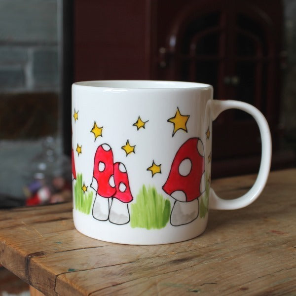 Hand painted mushroom mug. Hand painted fine china cup by Laura Lee in Cornwall