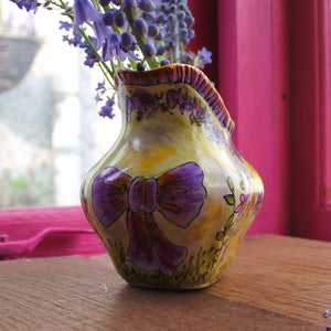 Hand painted purple bow on the vintage pimp bunny jug by Laura Lee Designs 