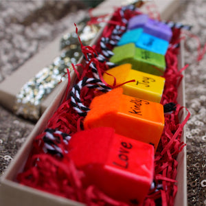 Rainbow of virtues hanging house ornaments in rainbow colours