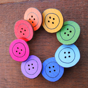 a rainbow of button brooches by Laura Lee Designs in Cornwall
