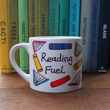 Load image into Gallery viewer, Child&#39;s size reading fuel mug scattered colourful books cup for reading Laura Lee Designs Cornwall