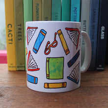 Load image into Gallery viewer, Colourful books readers fuel mug by Laura Lee Designs in Cornwall printed stoneware mug