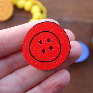 Red wooden button brooch by Laura Lee Designs in Cornwall